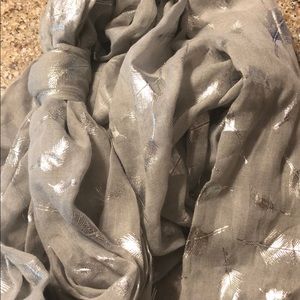 NWT gray scarf with silver feathers.